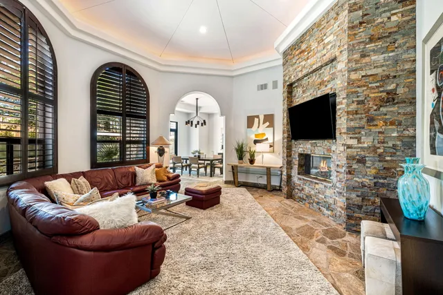 a spacious bathroom with a tub shower and sink