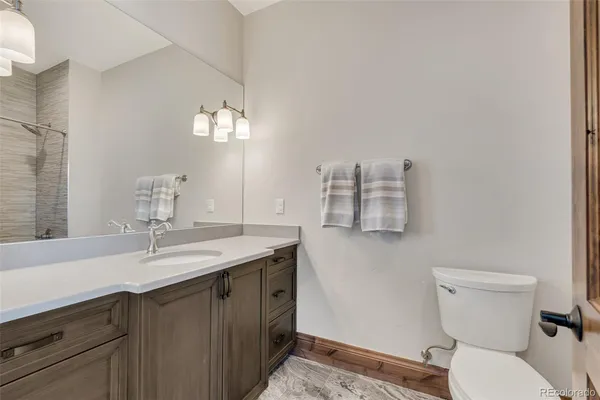 a bathroom with a sink and a toilet