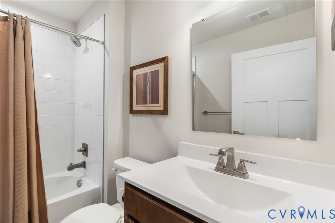 7735 Medalist Lane New Kent, VA 23124 - Photo 18 of 47 Bathroom featuring shower / bathtub combination wi