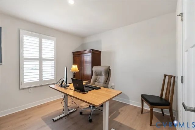 a front view of house with yard outdoor seating and barbeque oven