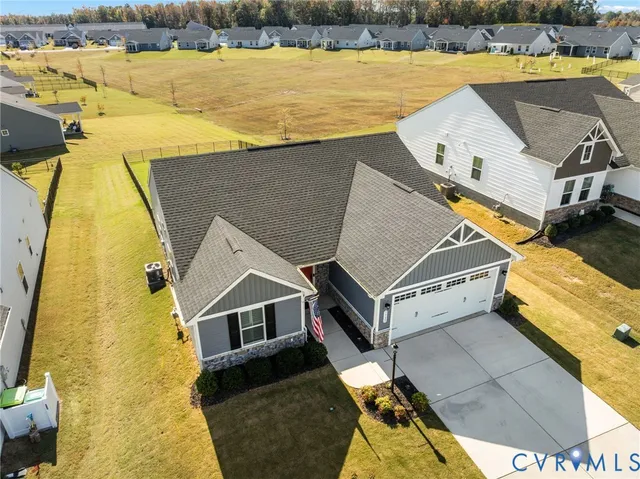 a view of a lake with boats and trees in the background