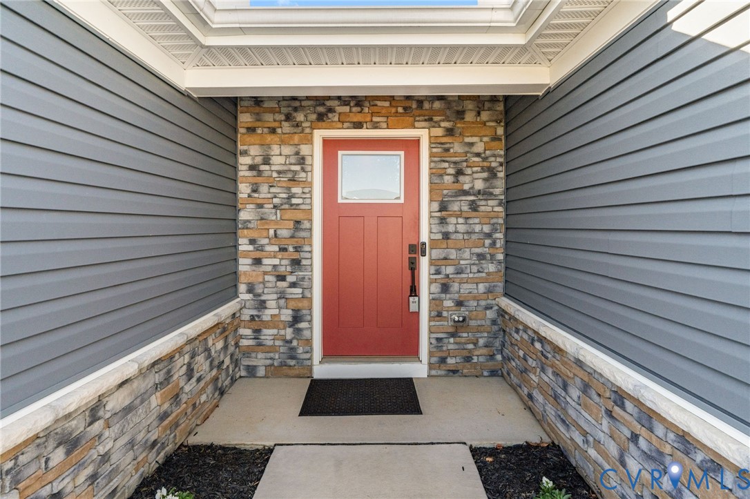 7735 Medalist Lane New Kent, VA 23124 - Photo 3 of 47 Property entrance featuring stone siding