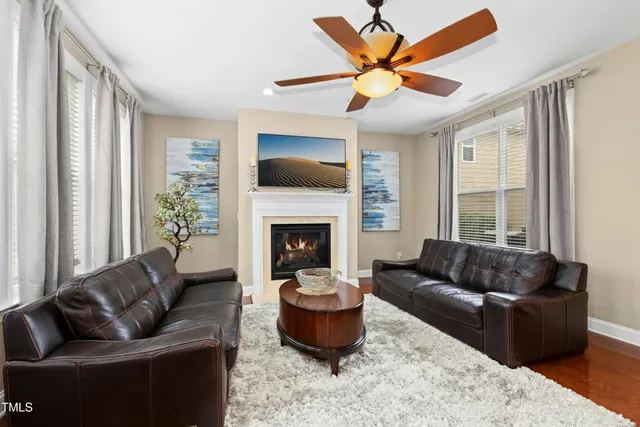 a view of a dining room with furniture and windows