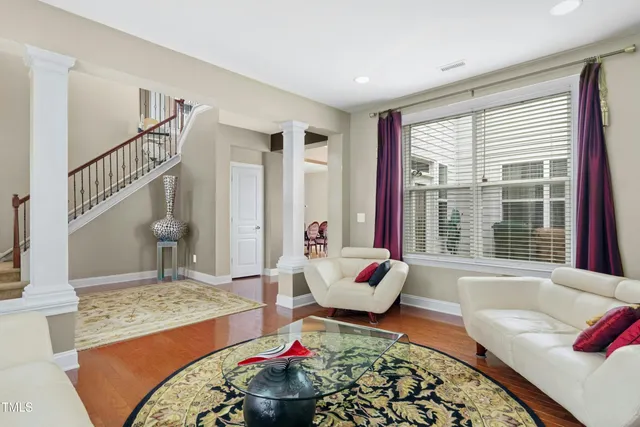 a view of a green field with trees