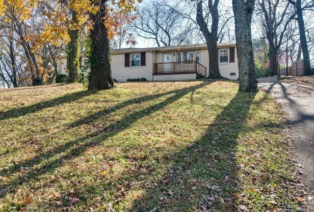 a house with trees in front of it