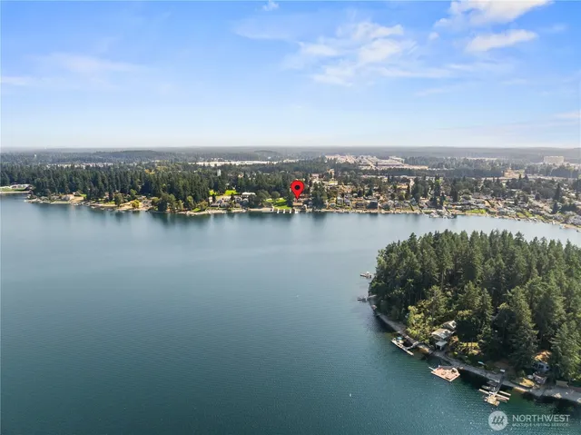 a view of a lake with houses