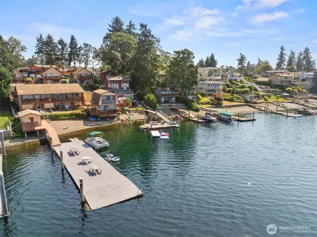 an aerial view of a house with a swimming pool