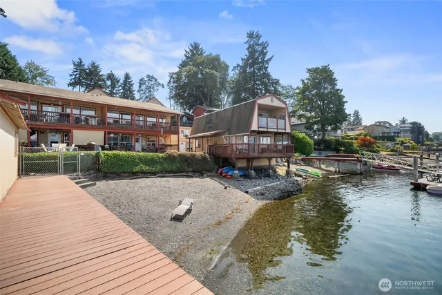 a swimming pool view with a garden space