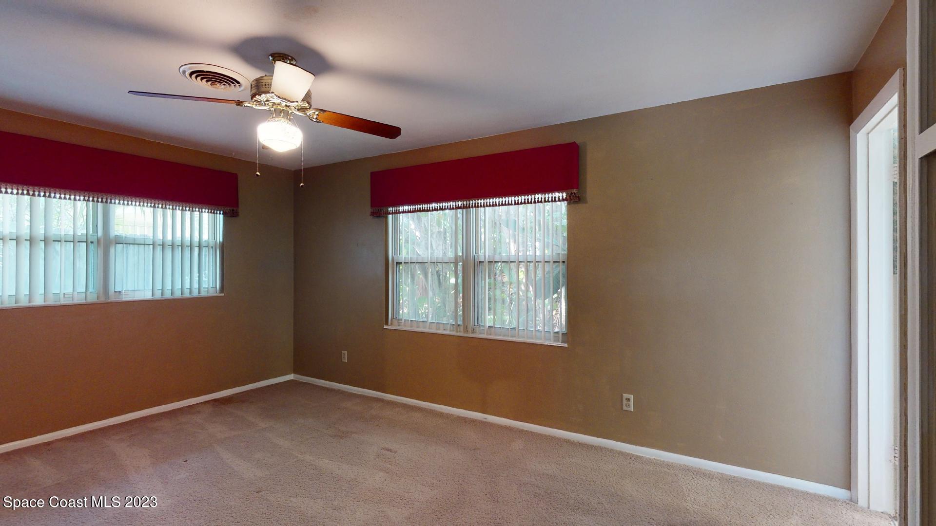 204 South Riverside Drive Indialantic, FL 32903 - Photo 13 of 24 a view of an empty room with a window