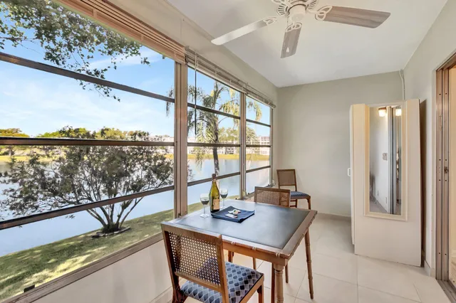 a view of a living room and entryway
