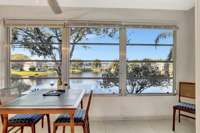 a living room with furniture and white walls