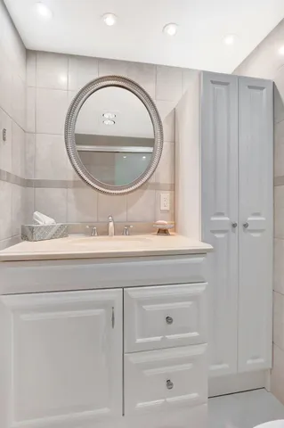 a view of a garden with a slide and a lake view