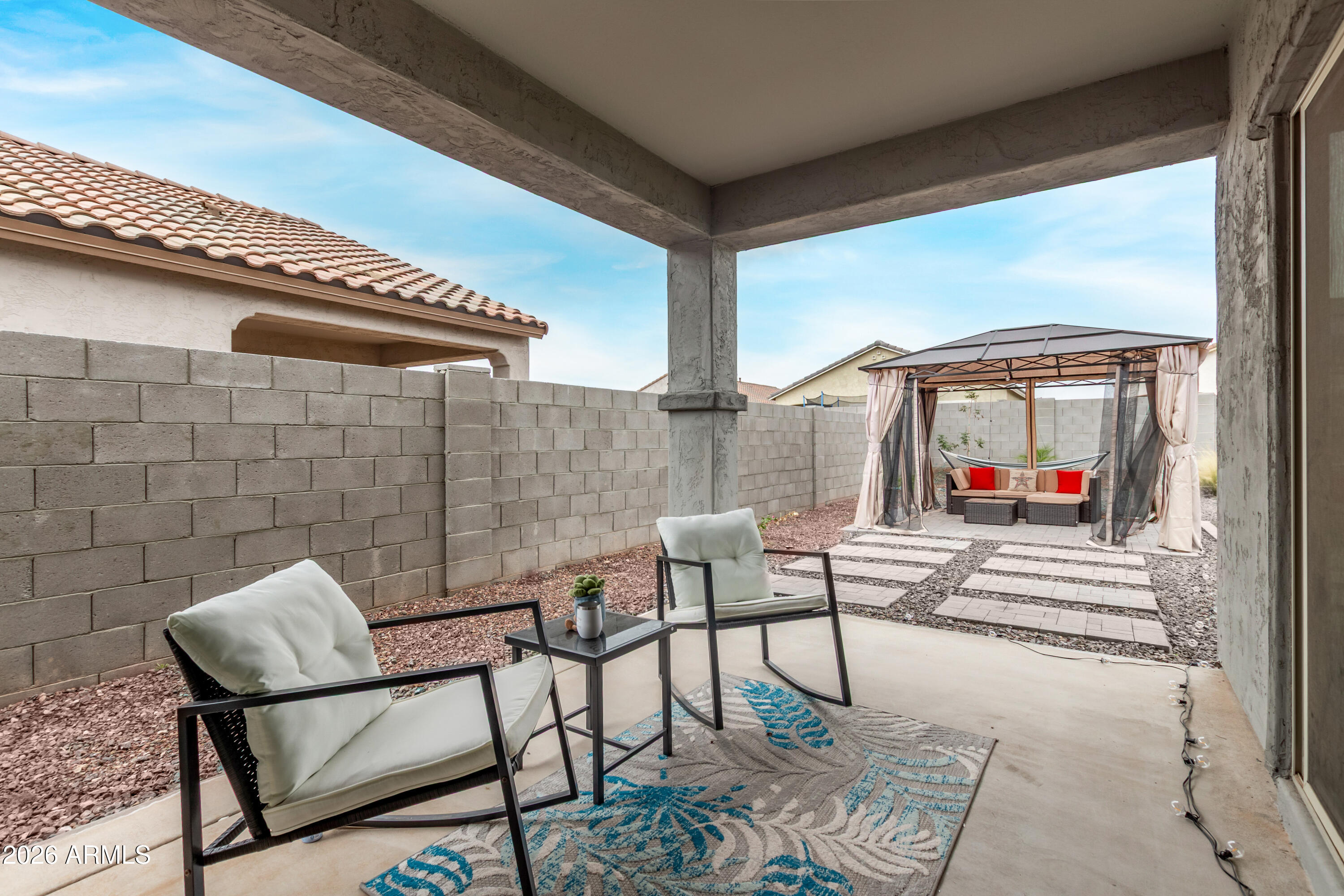 11214 West Bloch Road Tolleson, AZ 85353 - Photo 23 of 24 a view of a chairs and table in the balcony