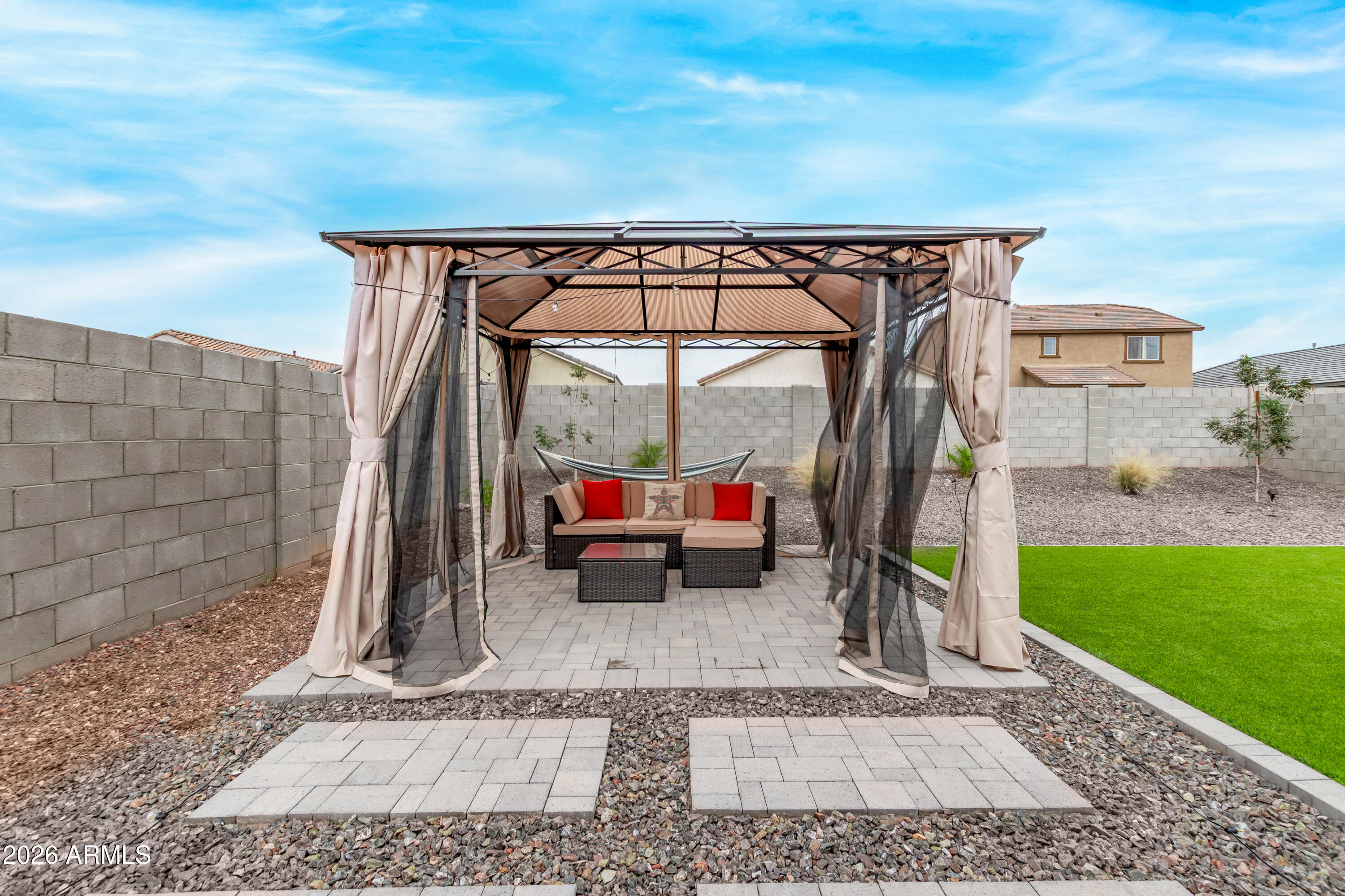 11214 West Bloch Road Tolleson, AZ 85353 - Photo 24 of 24 a view of a couches in the patio