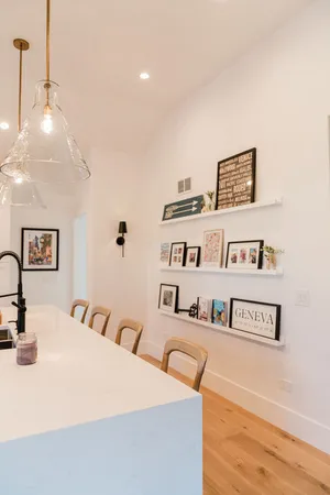 a bedroom with a bed and a night stand