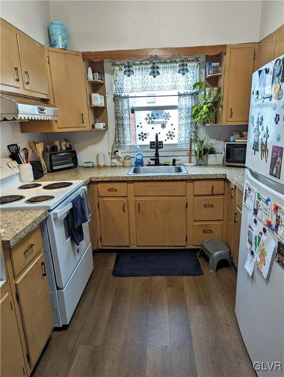 26 Reeder Street Mount Pocono, PA 18344 - Photo 7 of 11 a kitchen with stainless steel appliances granite countertop a stove a sink dishwasher and cabinets with wooden floor