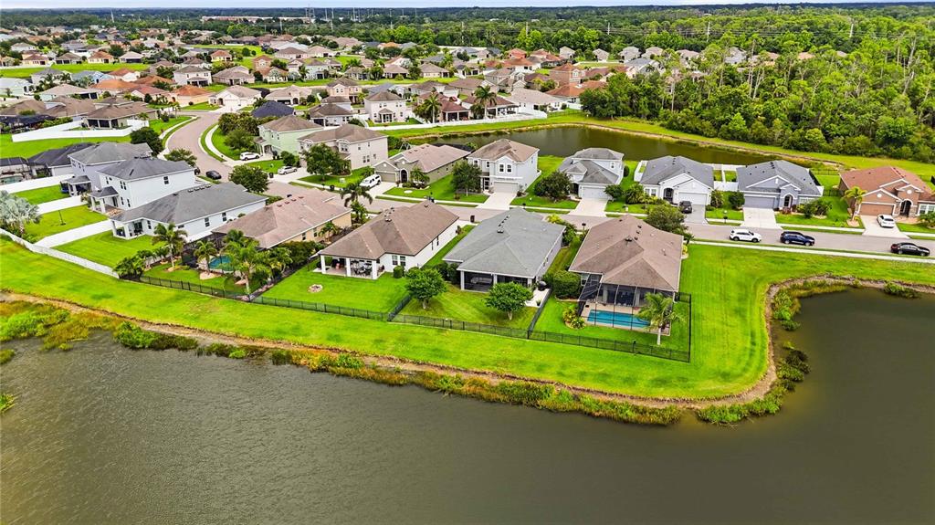 10920 79th Street East Parrish, FL 34219 - Photo 68 of 73 an aerial view of residential house with outdoor space and swimming pool