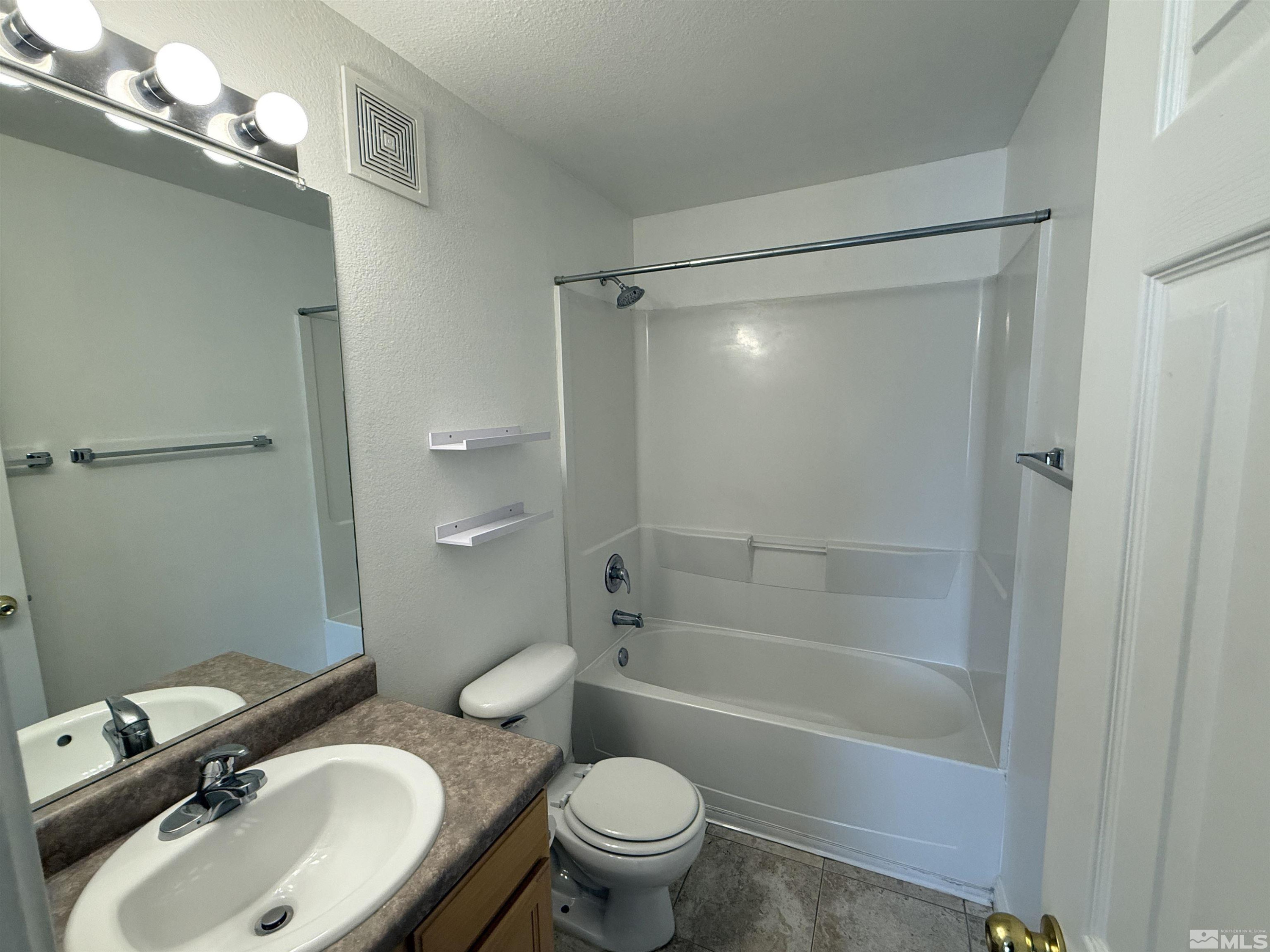 200 Talus Way, Unit 232 Reno, NV 89503 - Photo 20 of 29 a bathroom with a sink toilet and shower
