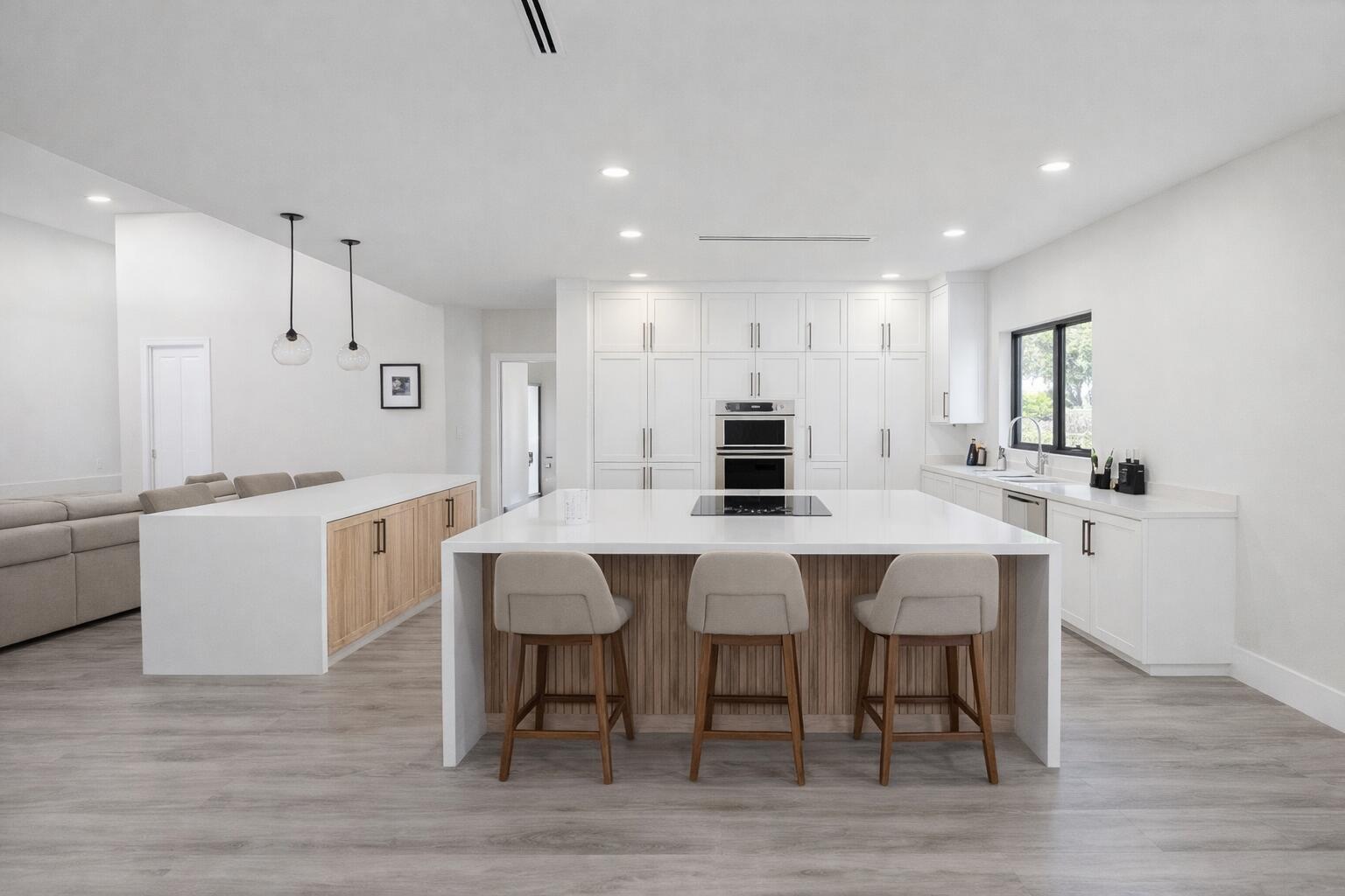 12681 Southwest 78th Street Miami, FL 33183 - Photo 3 of 16 Modern kitchen with quartz island