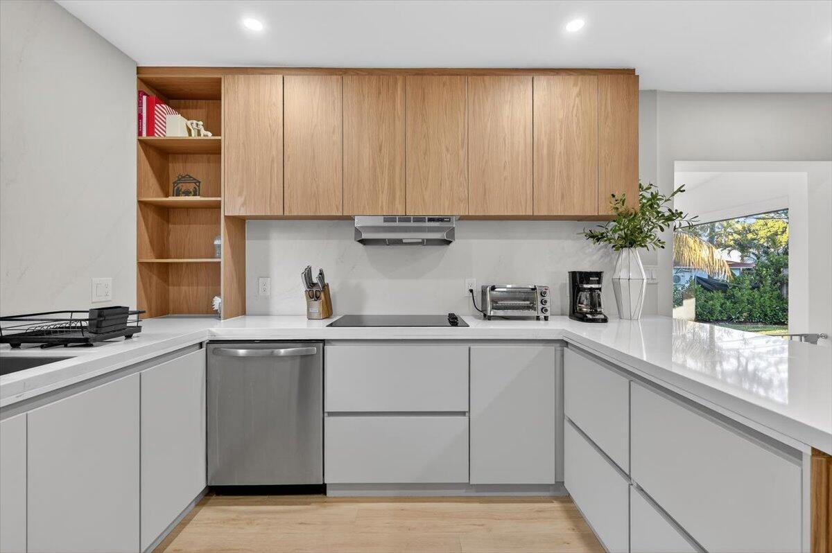 2601 Southwest 26th Lane Miami, FL 33133 - Photo 12 of 34 a kitchen with a sink cabinets and window
