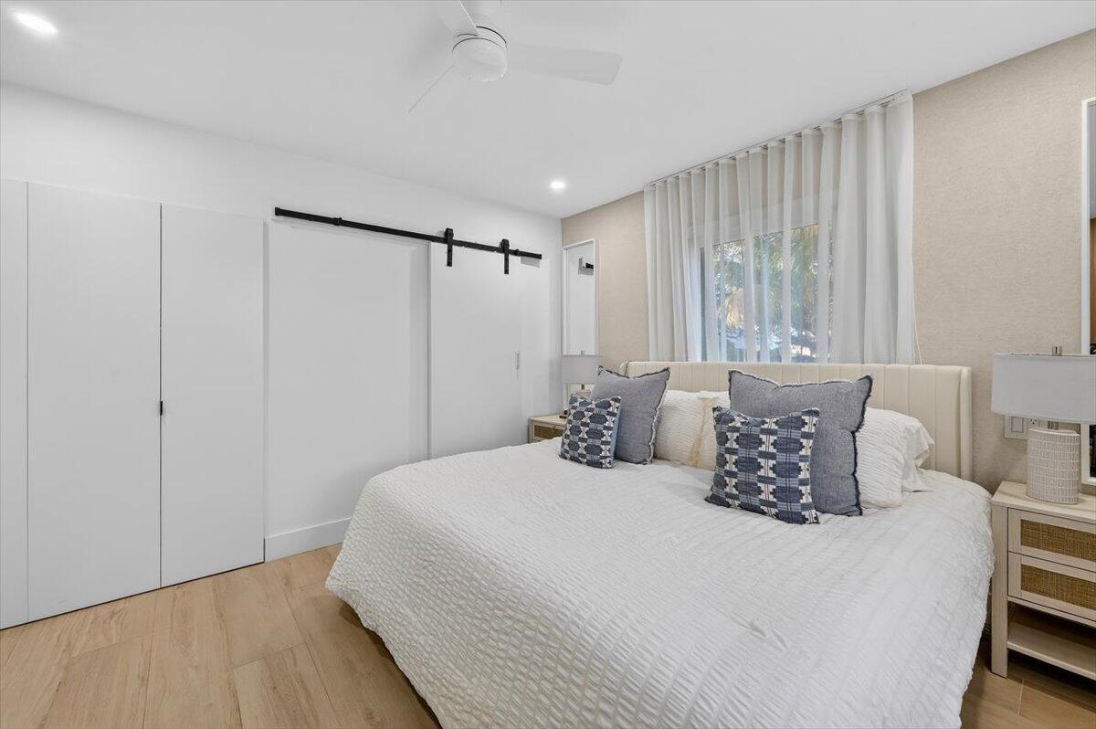 2601 Southwest 26th Lane Miami, FL 33133 - Photo 16 of 34 a bedroom with a bed and a window