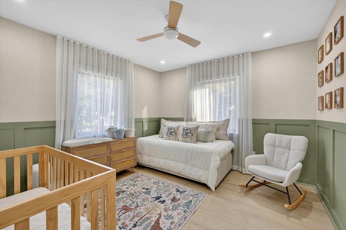 2601 Southwest 26th Lane Miami, FL 33133 - Photo 21 of 34 a living room with furniture and two windows