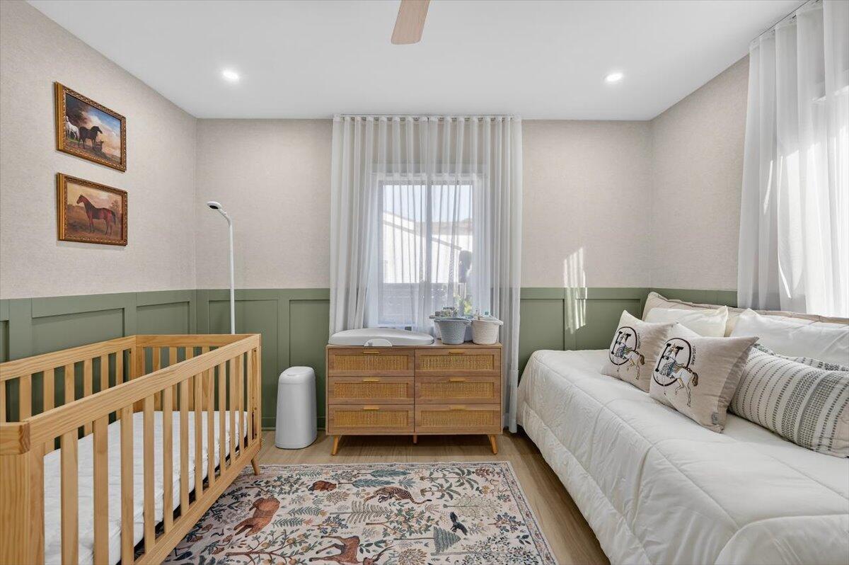 2601 Southwest 26th Lane Miami, FL 33133 - Photo 22 of 34 a bedroom with furniture and a window