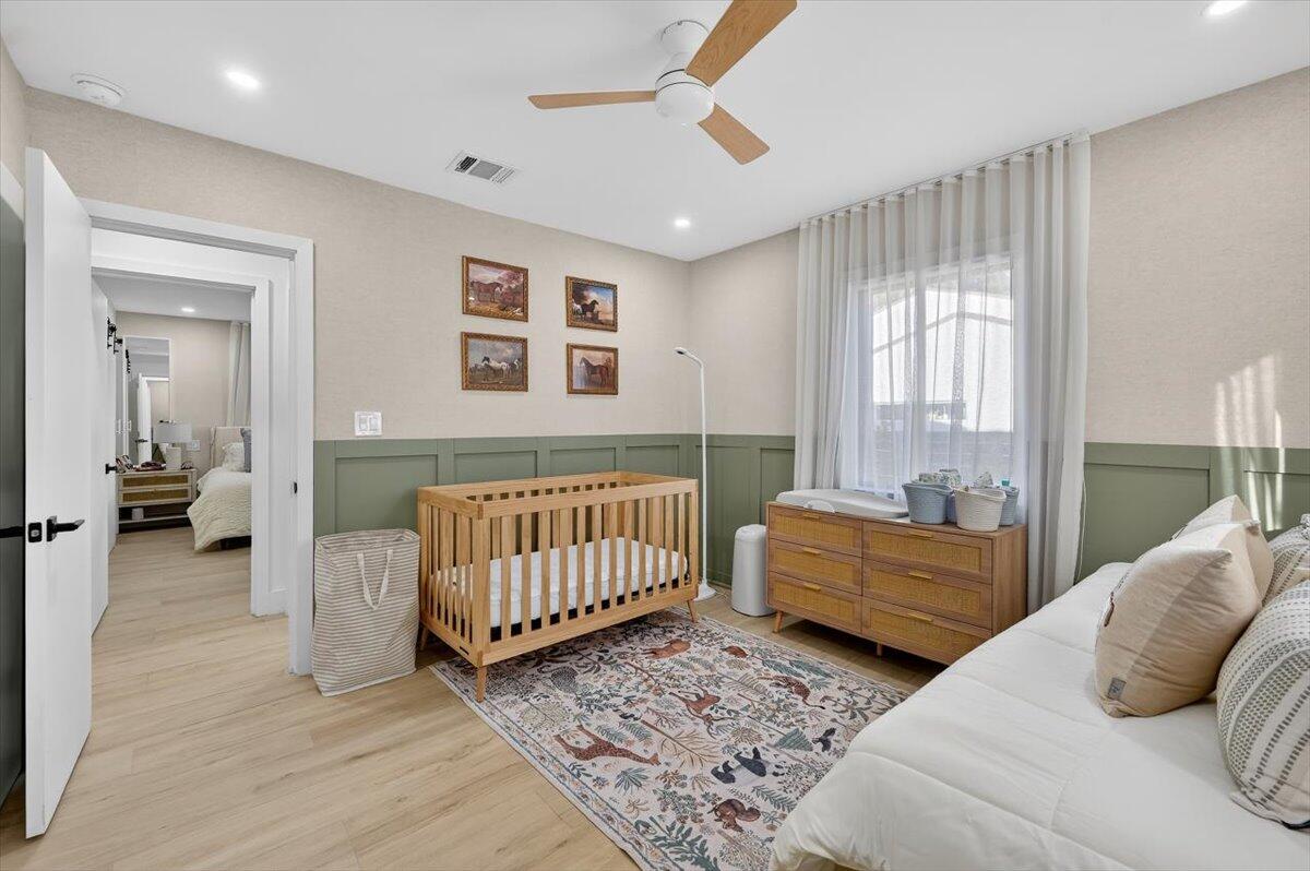 2601 Southwest 26th Lane Miami, FL 33133 - Photo 23 of 34 a bedroom with furniture and a window