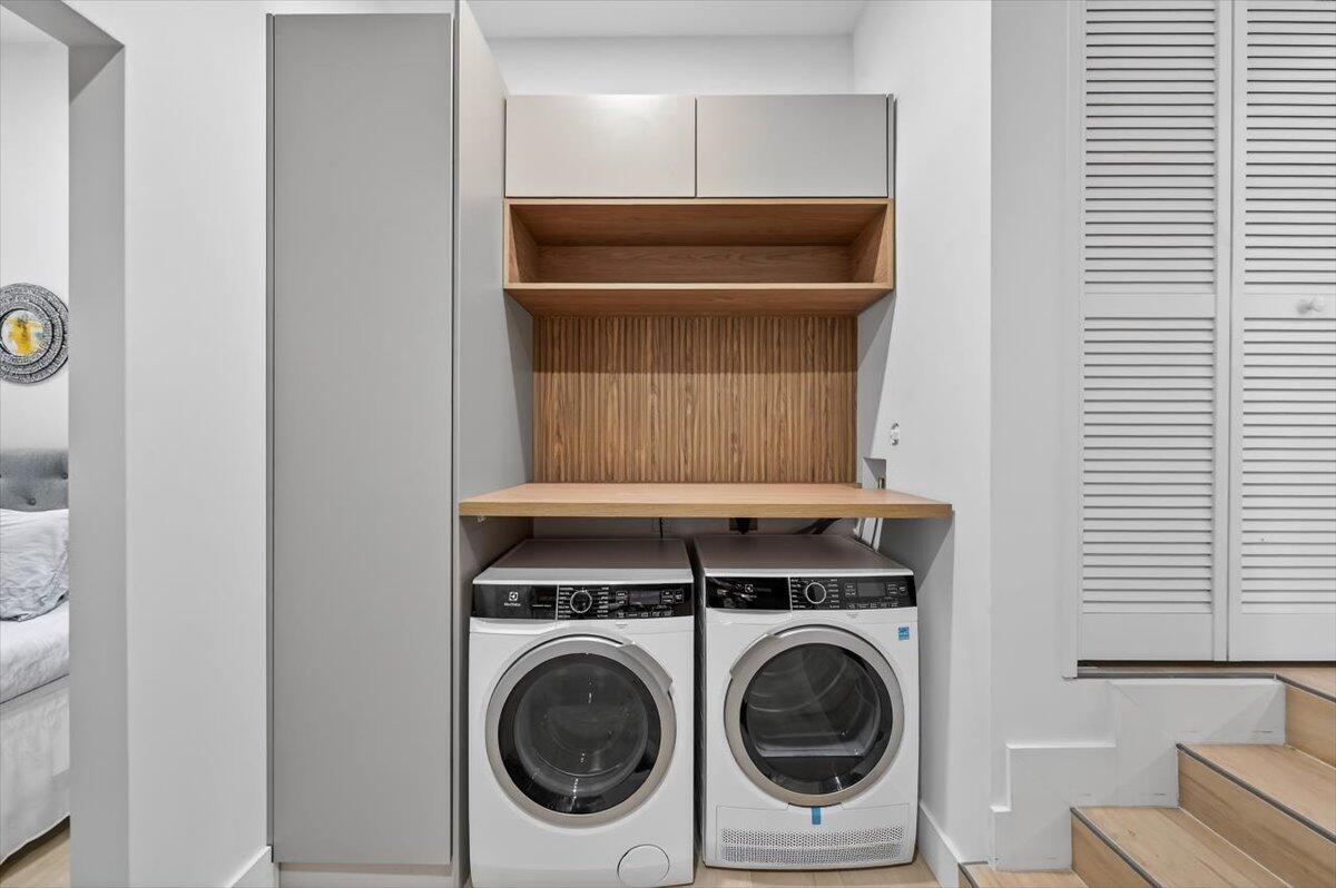 2601 Southwest 26th Lane Miami, FL 33133 - Photo 30 of 34 a room with a washer and dryer