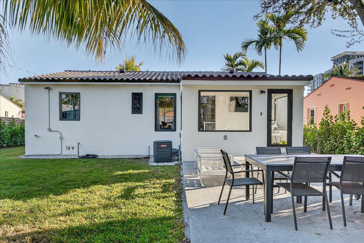 2601 Southwest 26th Lane Miami, FL 33133 - Photo 33 of 34 a front view of house with yard and outdoor seating