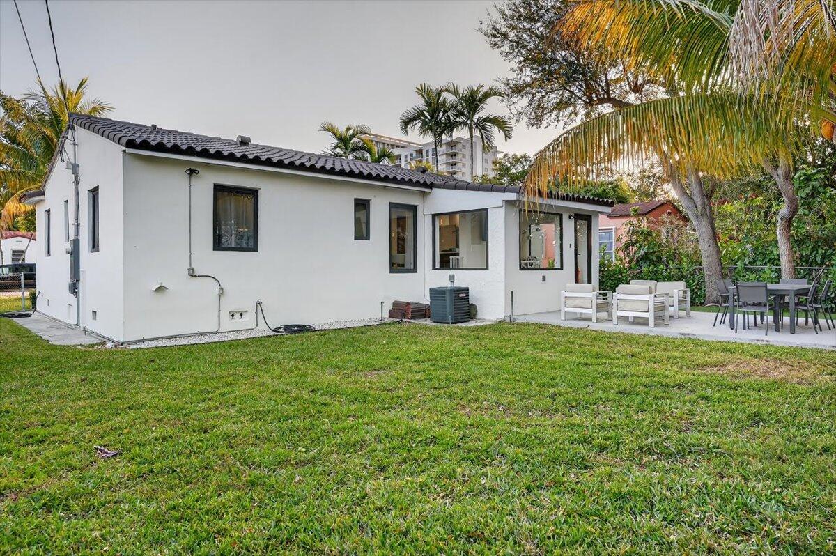 2601 Southwest 26th Lane Miami, FL 33133 - Photo 34 of 34 a front view of house with yard and outdoor seating