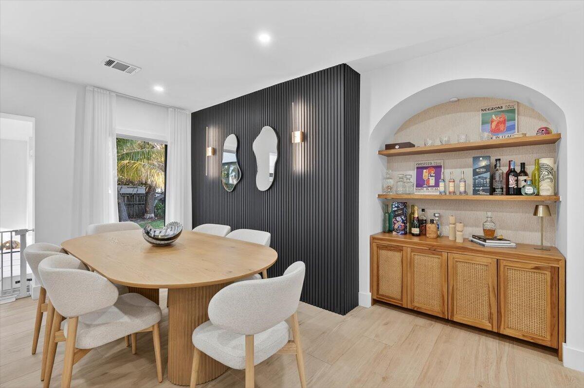 2601 Southwest 26th Lane Miami, FL 33133 - Photo 7 of 34 a view of a dining room with furniture