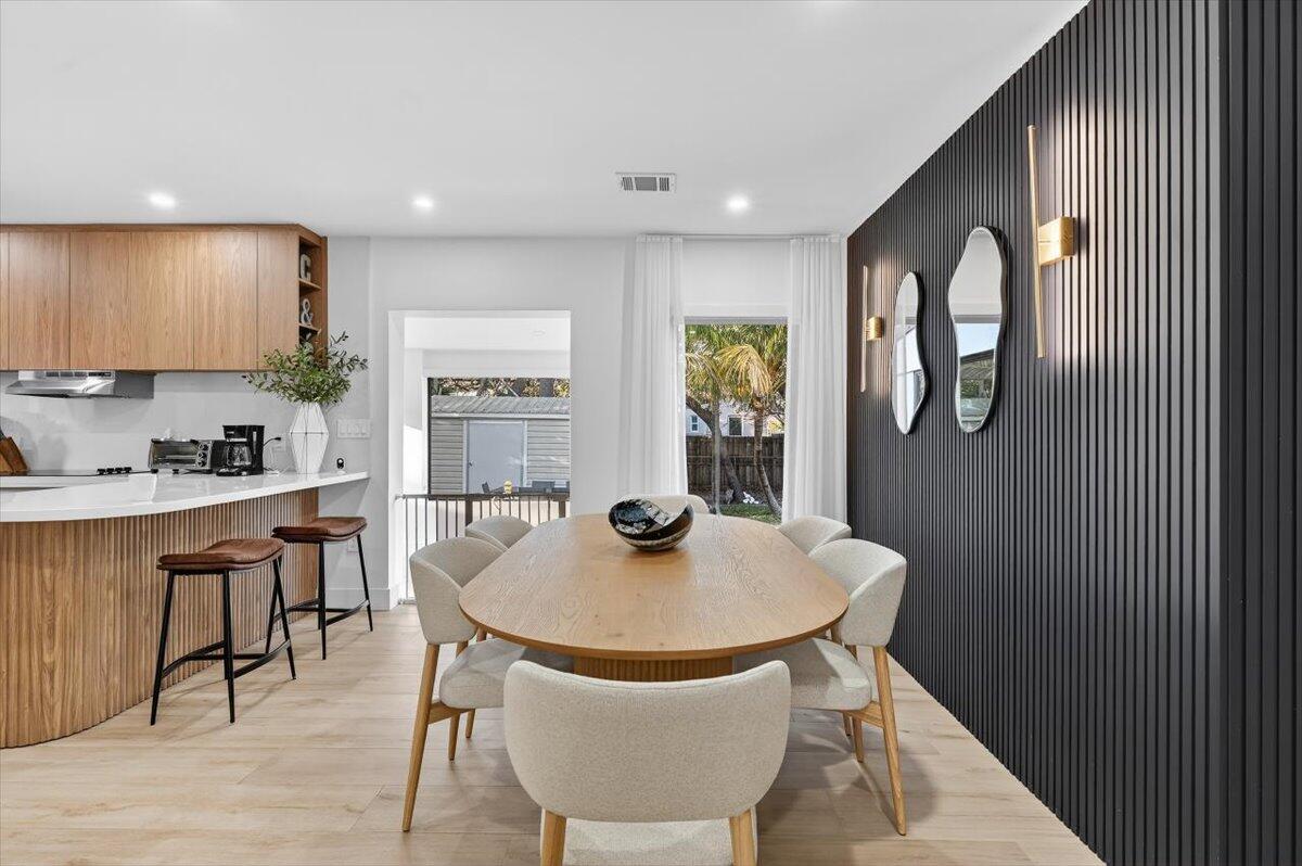 2601 Southwest 26th Lane Miami, FL 33133 - Photo 9 of 34 a dining room with furniture and window
