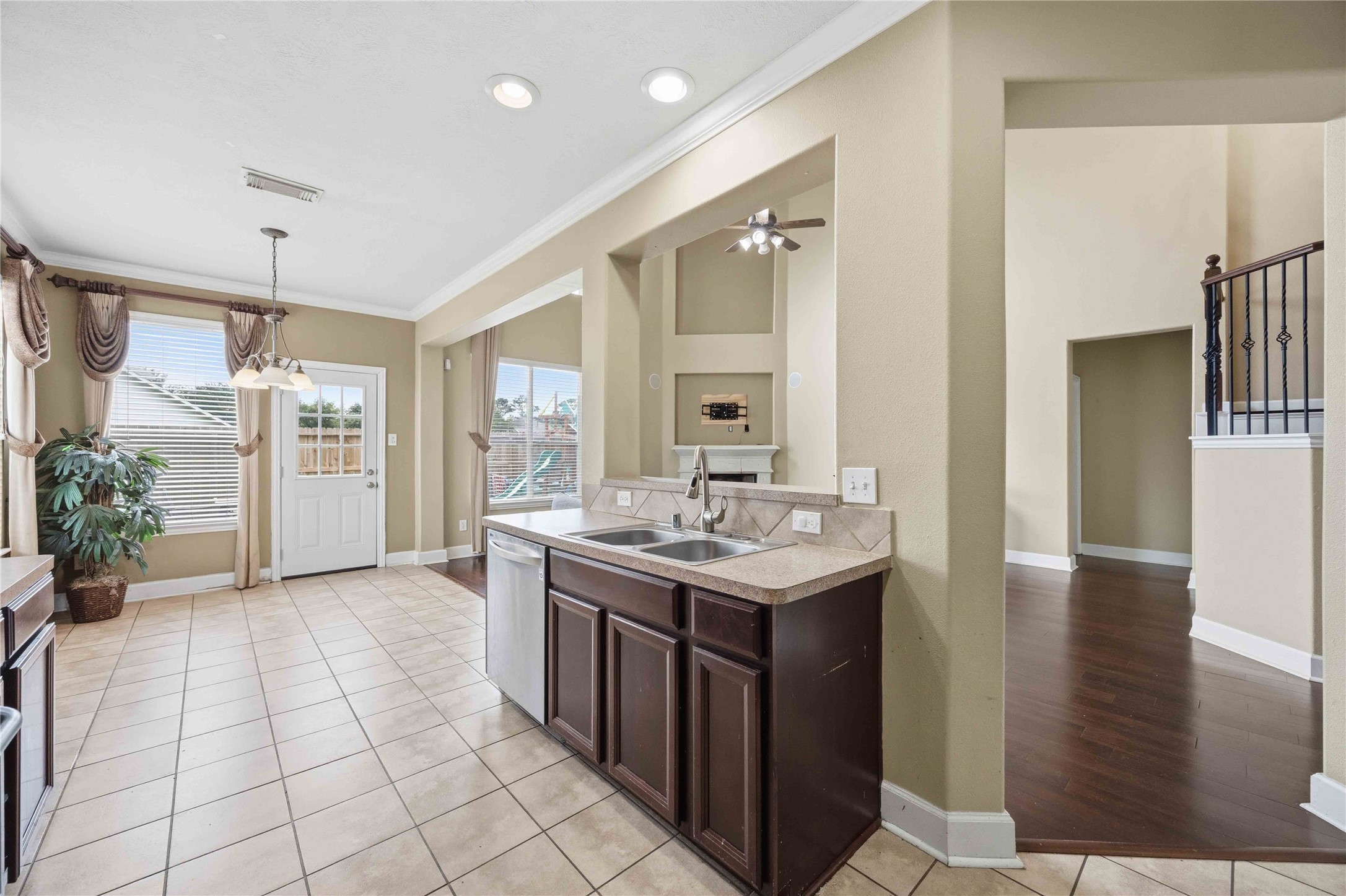 803 Northridge Terrace Lane Spring, TX 77373 - Photo 17 of 42 a kitchen with a sink and a refrigerator