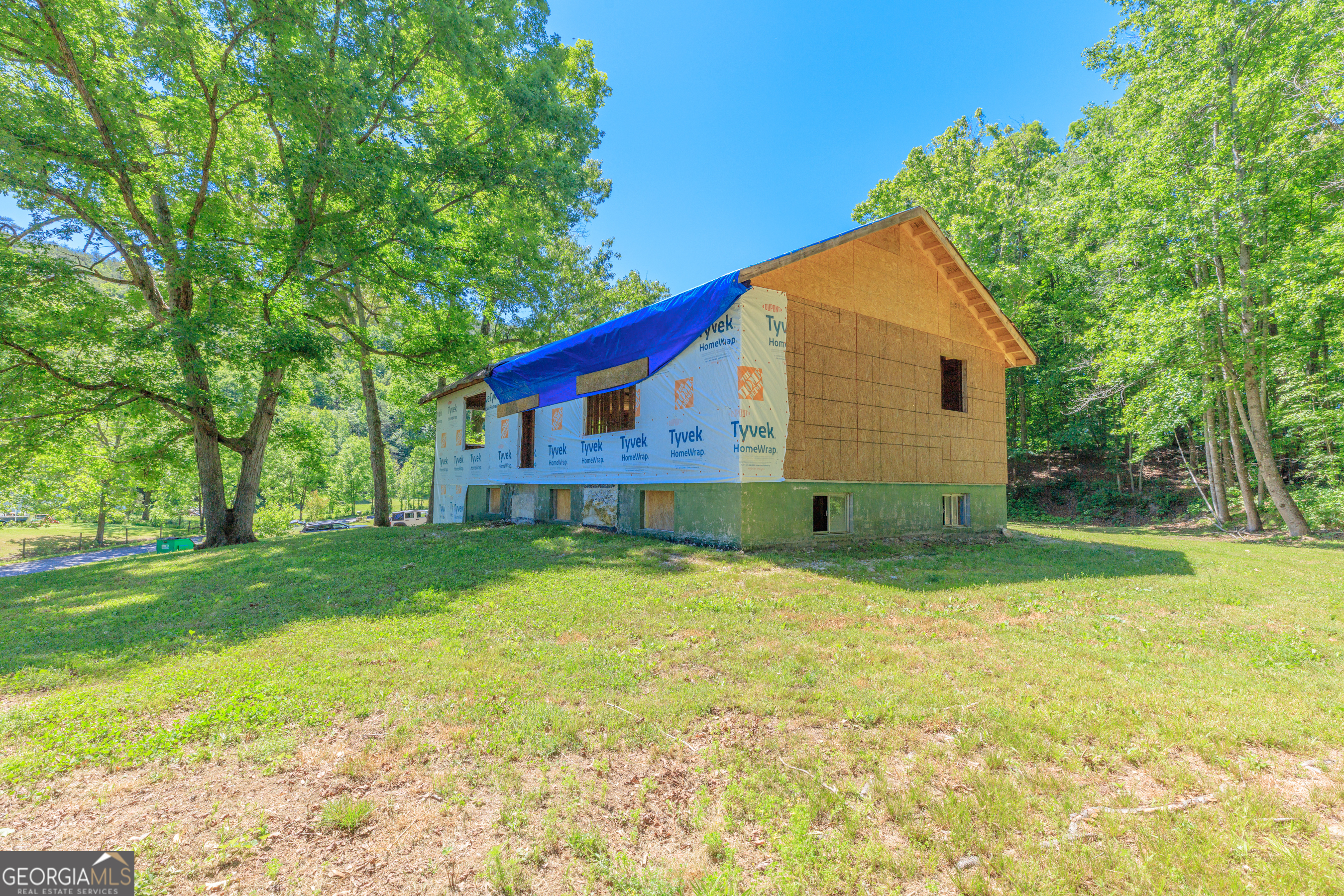 1004 Crow Gap Road Chickamauga, GA 30707 - Photo 3 of 36 a view of a house with a yard