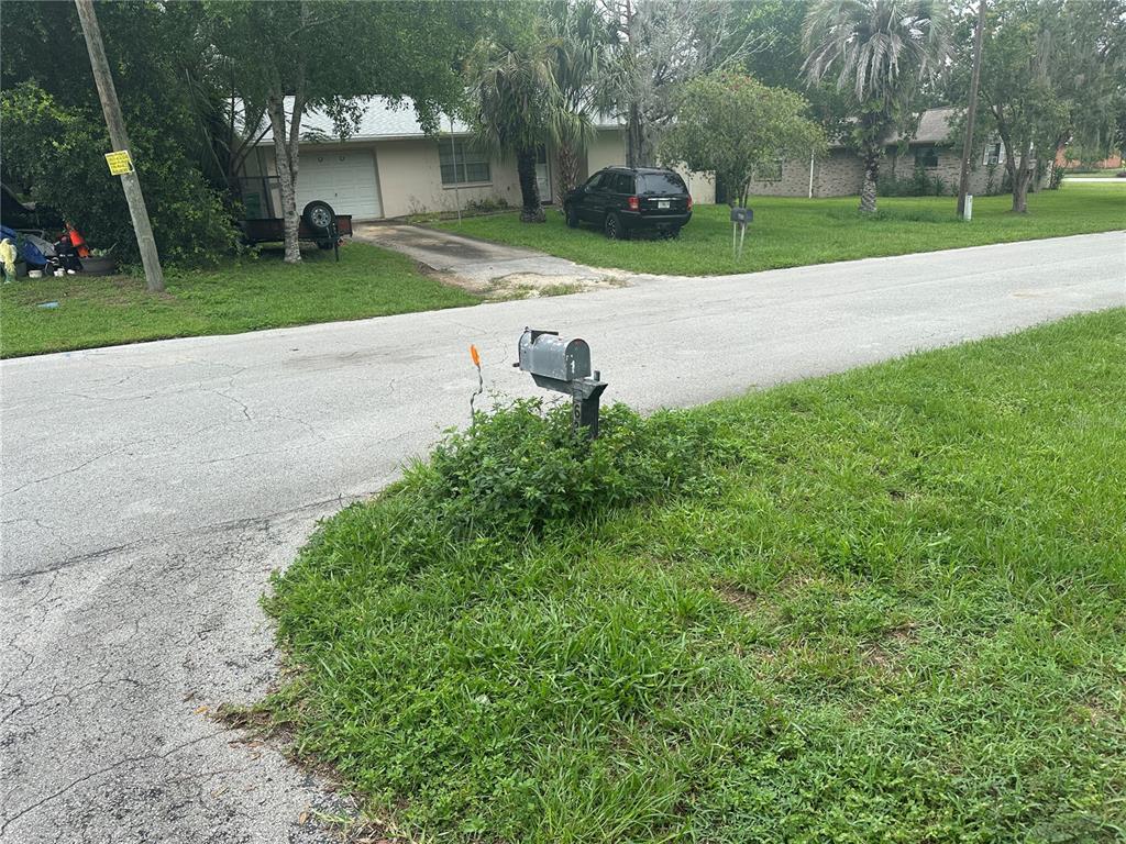626 Balboa Avenue Inverness, FL 34452 - Photo 3 of 3 a view of a park with of a house in the background