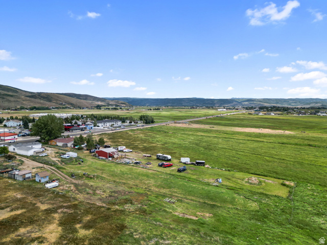 490 South Main Street Kamas, UT 84036 - Photo 20 of 25 Expansive rural landscape featuring vast green fields and distant rolling hills