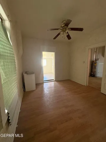 a view of a livingroom with a staircase