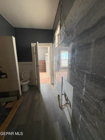 a view of livingroom with furniture and windows