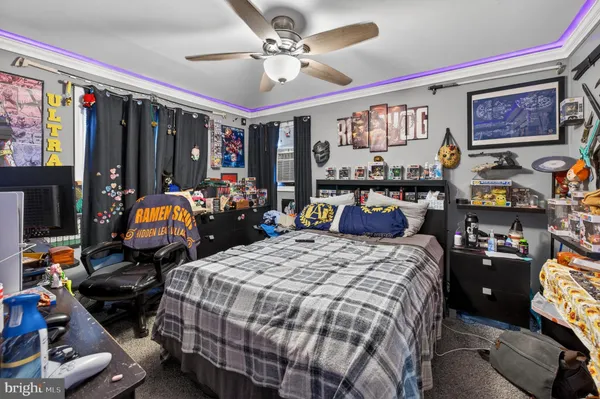 a bed room with bed and furniture