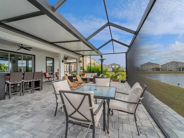 a view of a dining room with furniture window and outside view