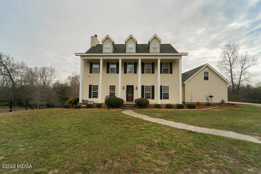 5281 Purple Road Byron, GA 31008 - Photo 1 of 42 a view of a house with a yard