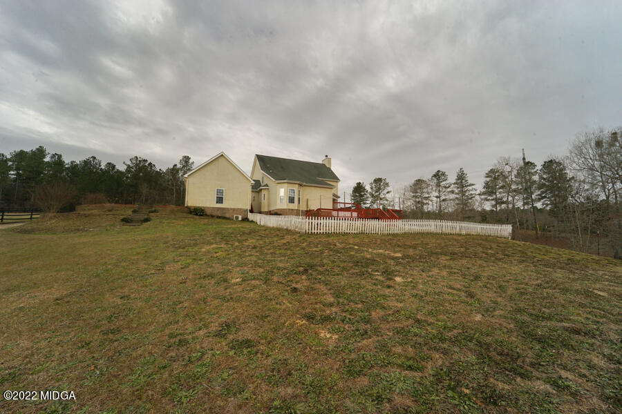 5281 Purple Road Byron, GA 31008 - Photo 37 of 42 a view of a house with a yard