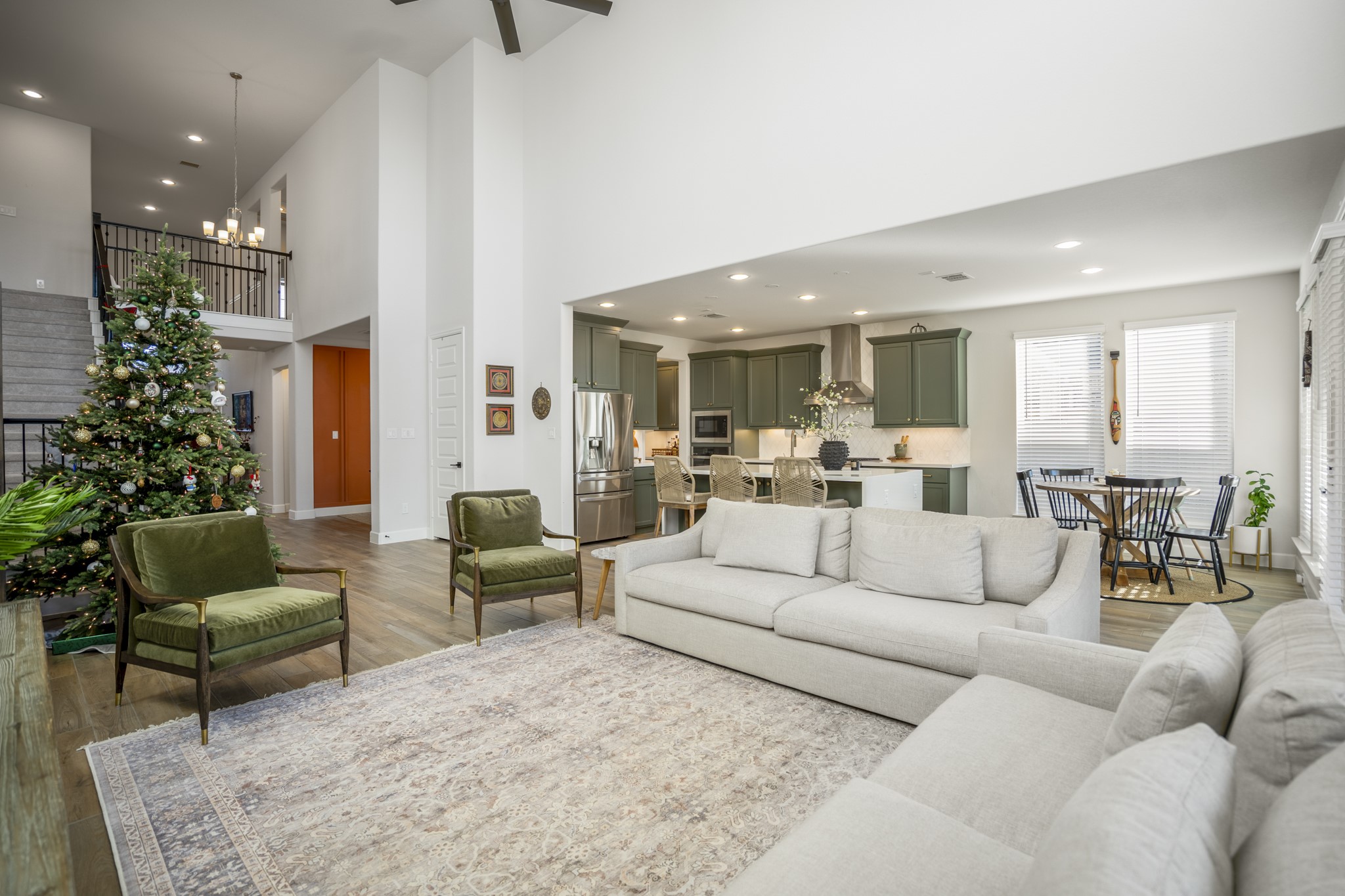 4226 Ana Ridge Lane Fulshear, TX 77441 - Photo 13 of 50 a living room with furniture kitchen view and large windows