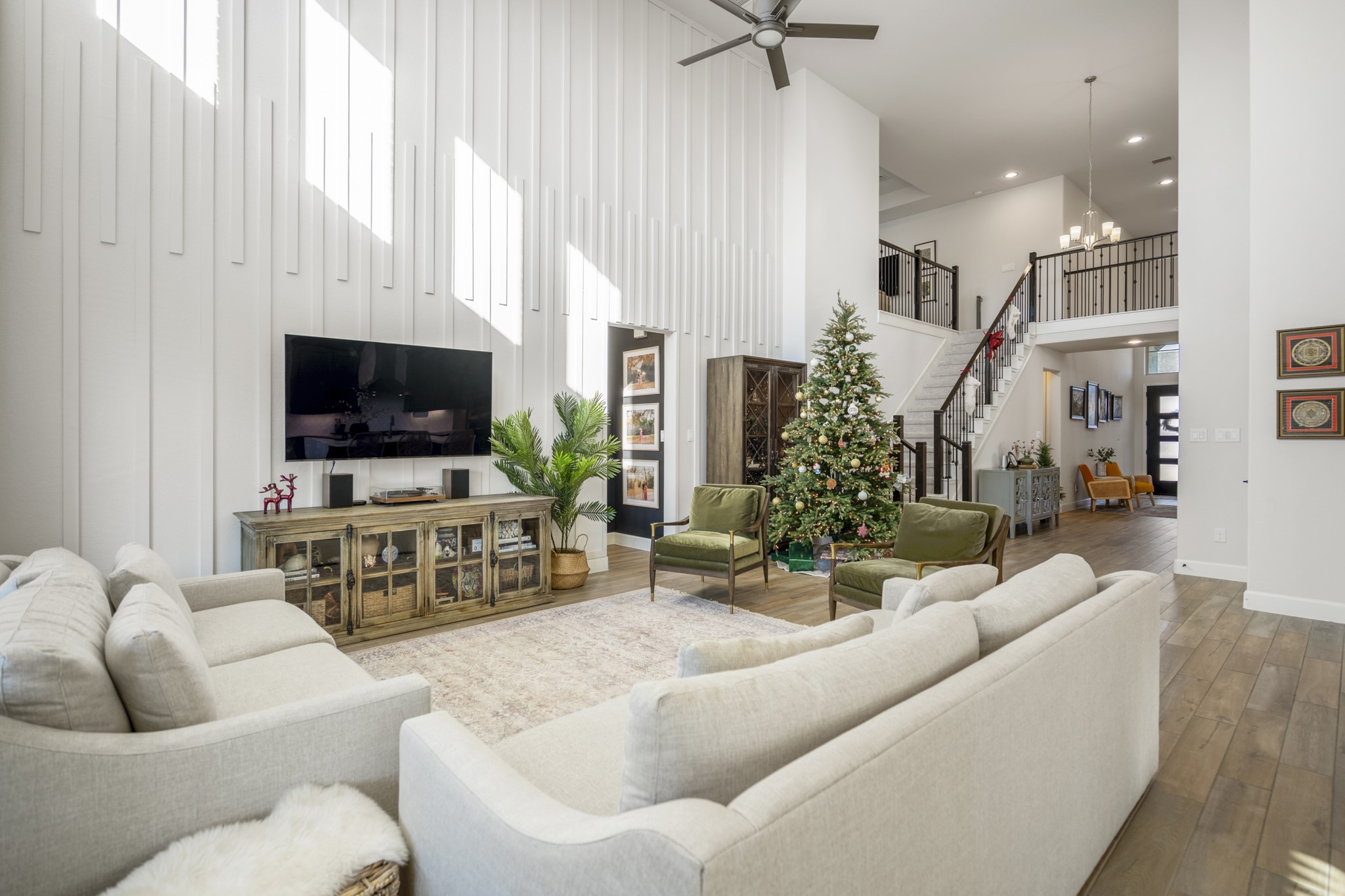 4226 Ana Ridge Lane Fulshear, TX 77441 - Photo 14 of 50 a living room with furniture and a flat screen tv