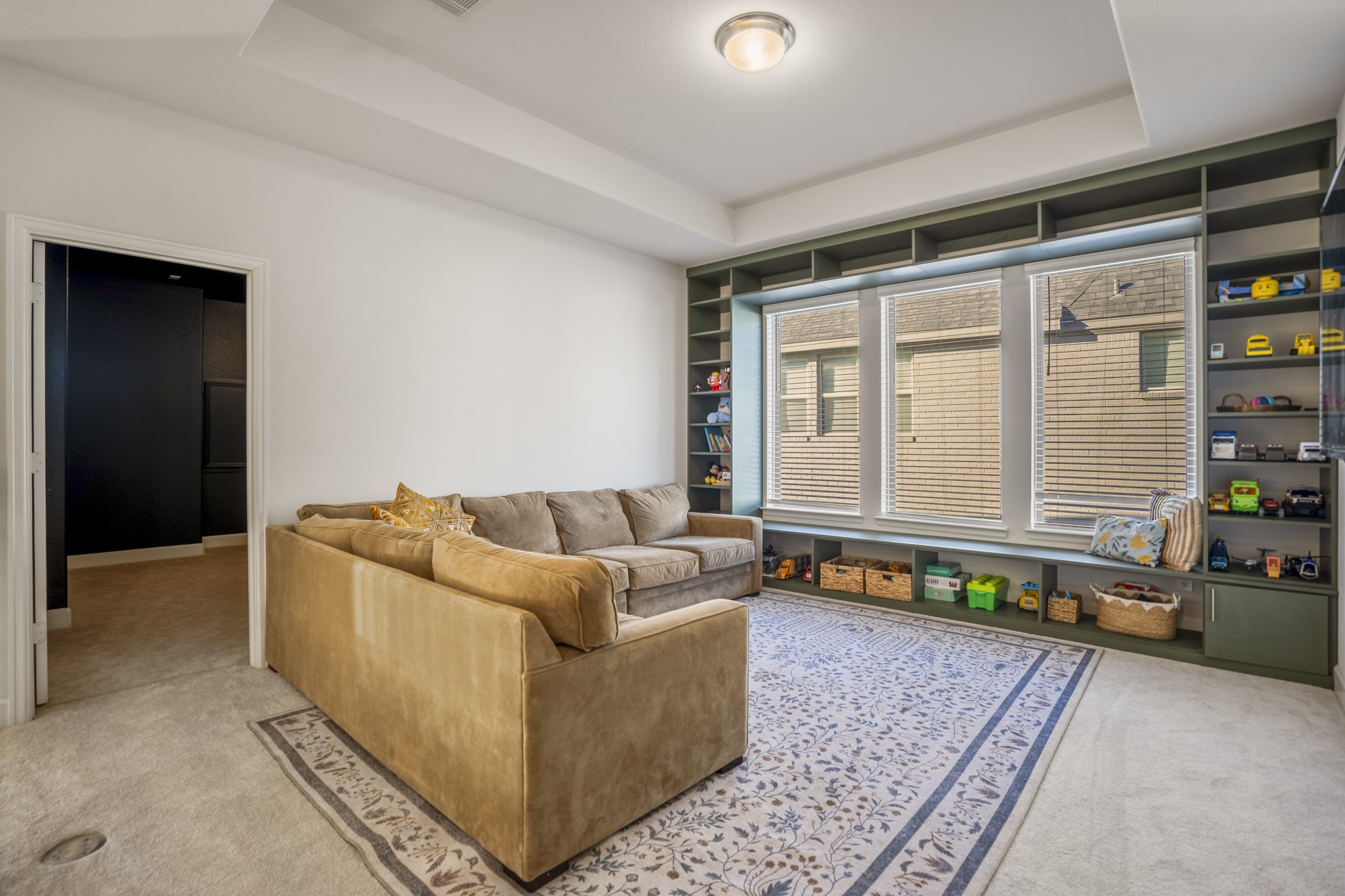 4226 Ana Ridge Lane Fulshear, TX 77441 - Photo 38 of 50 a living room with furniture and a window