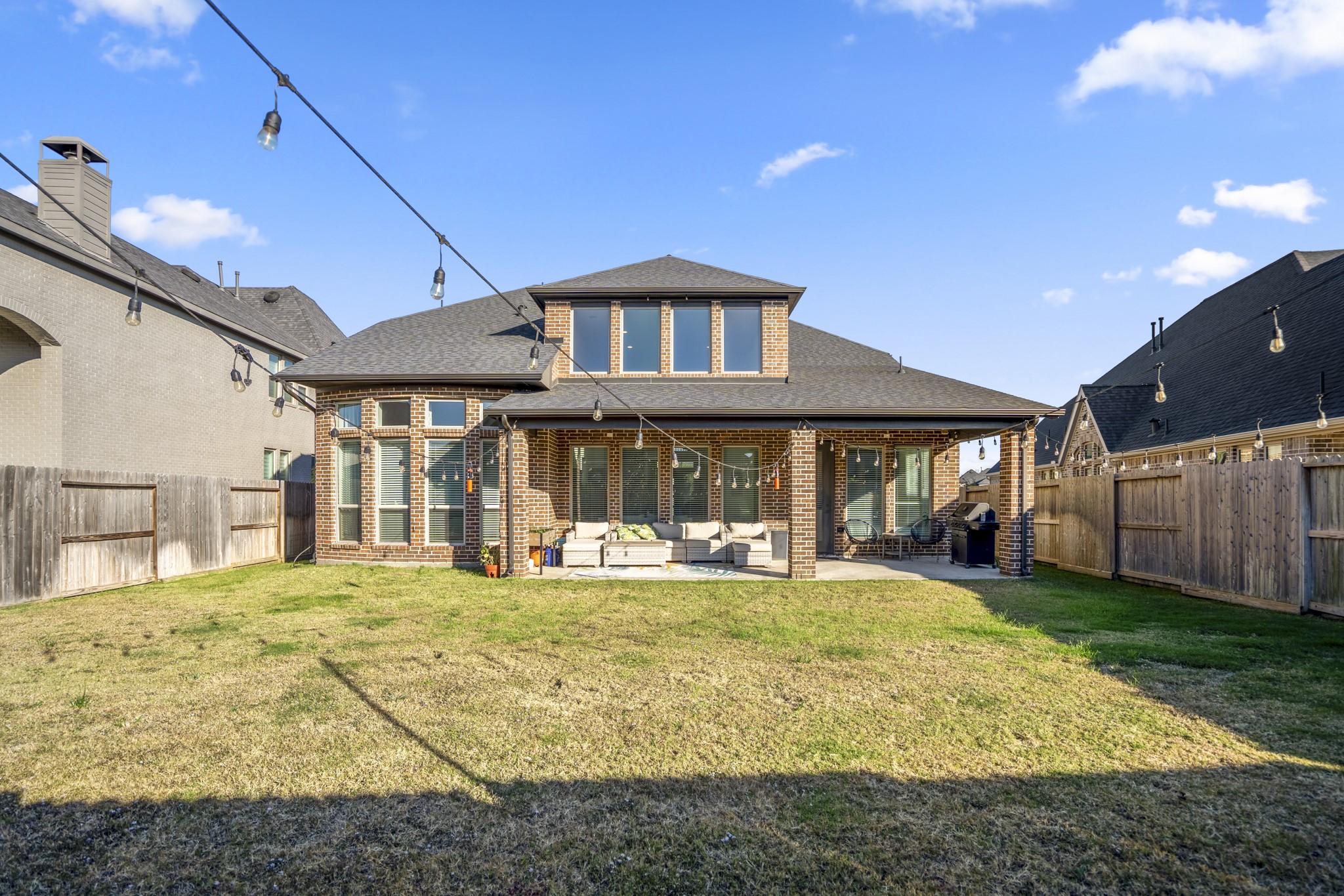 4226 Ana Ridge Lane Fulshear, TX 77441 - Photo 47 of 50 a view of a house with a yard porch and sitting area