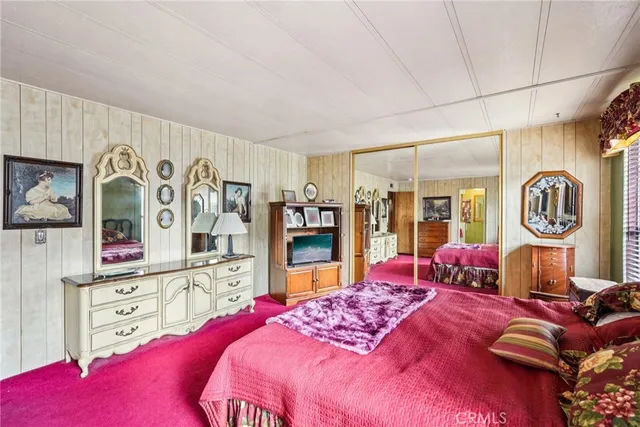 a bathroom with a sink double vanity and a mirror