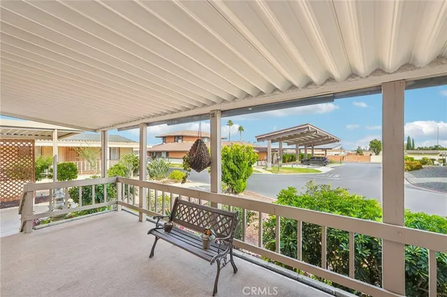 a view of a porch with furniture