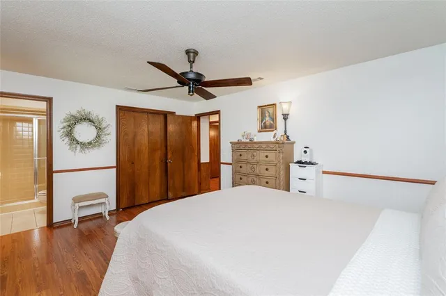 a bathroom with a shower and a tub